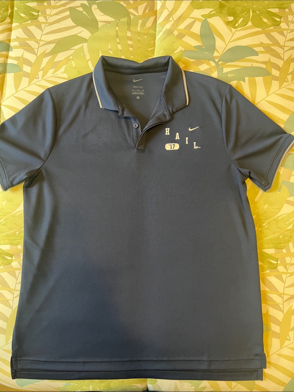 Nike Men’s Navy Polo with Gold Accents